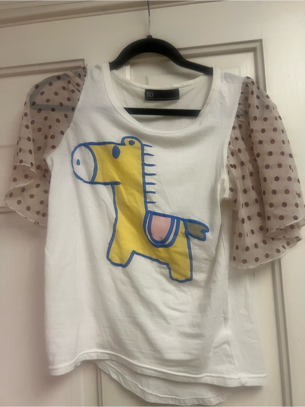 Women’s fitted tee , sleeves are long ruffle